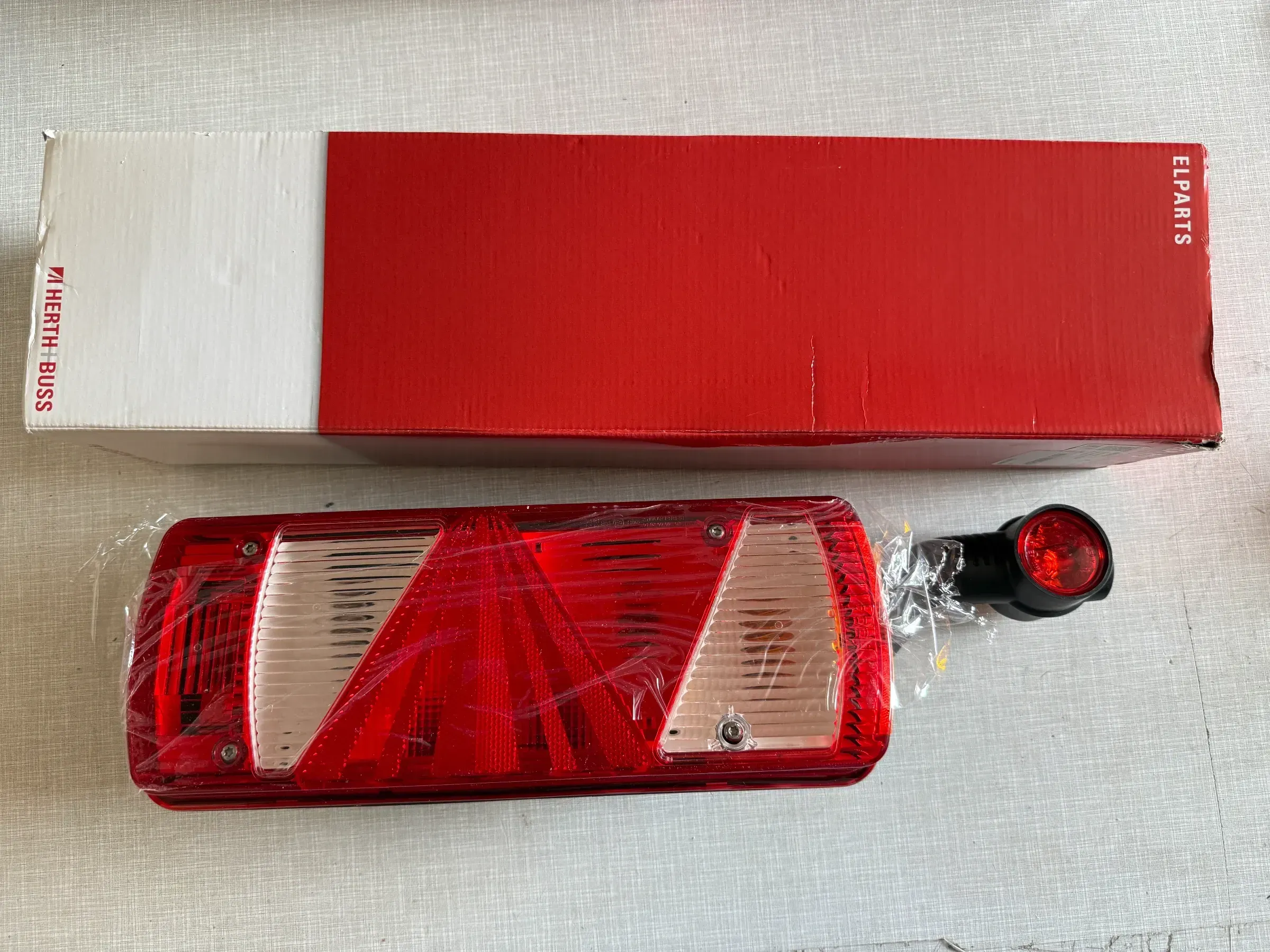 Herth+Buss Fahrzeugteile GmbH & Co. KG Heckleuchte links 83830161 NEU - Bild 1
